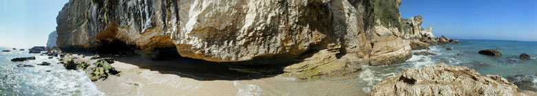 Panoramic at the foot of the cliffs of el Acantilado y Pinar de Barbate nature park near Los Caños de Meca