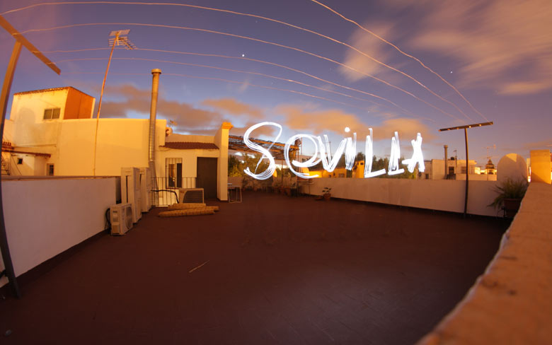 One of the guests doing an experiment on the roof terrace of the apartment.