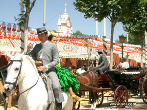 Cavalli e carrozze a la fiera di Siviglia