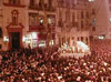 The crowd watching the Virgen of the Baratillo fraternity.