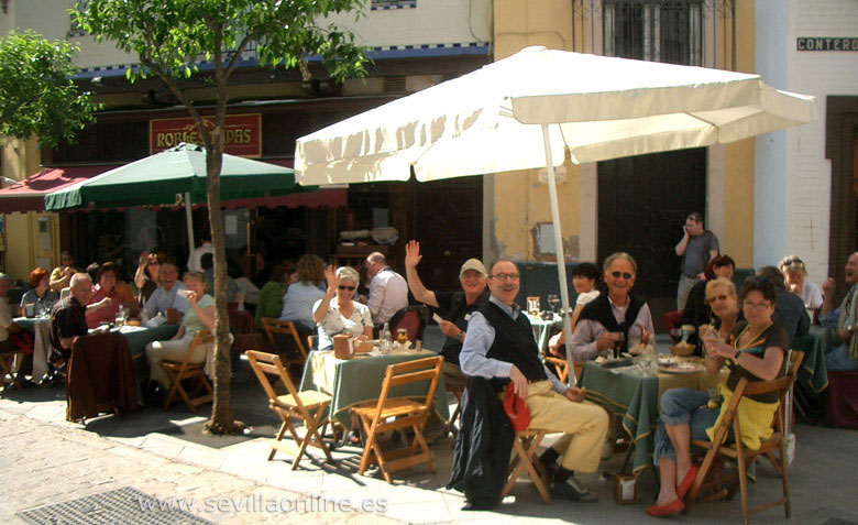 Enjoying the sun on a terrace in Seville.